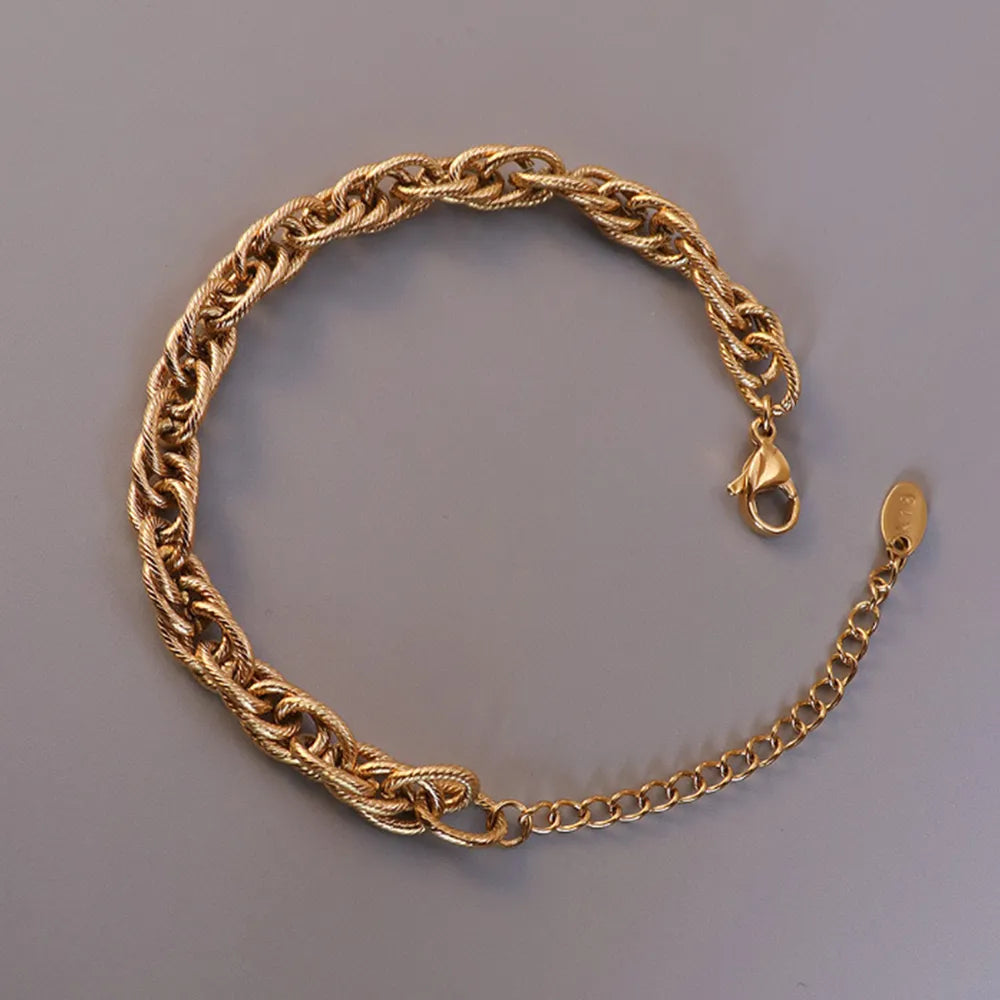 Armband „Niora“ – Gliederarmband aus Titanstahl, vergoldet