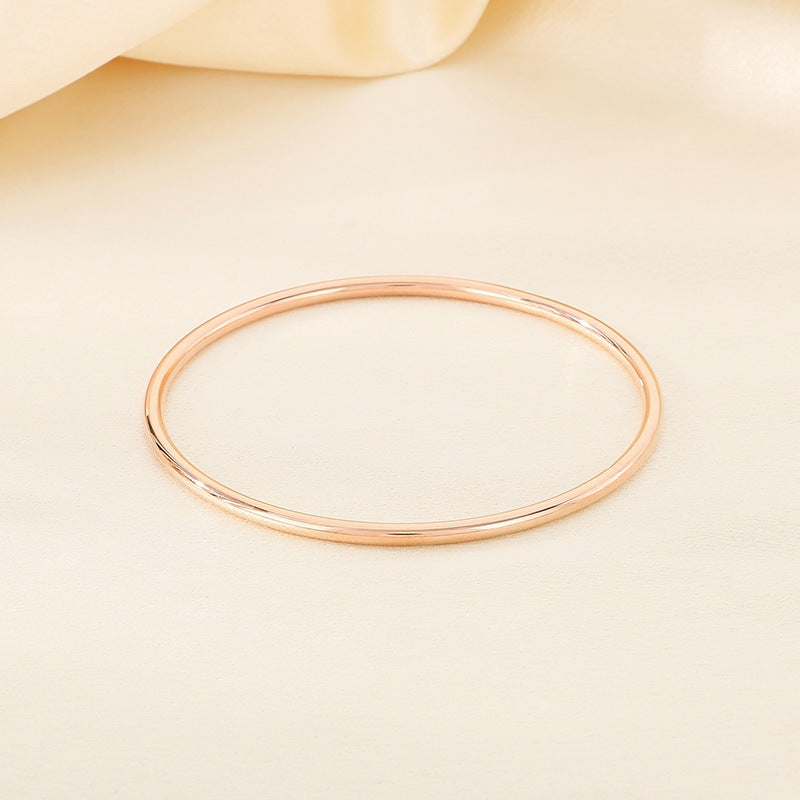 Armreif „Serra“ – Eleganter Damen-Armreif aus Titanstahl in Gold, Silber oder Roségold