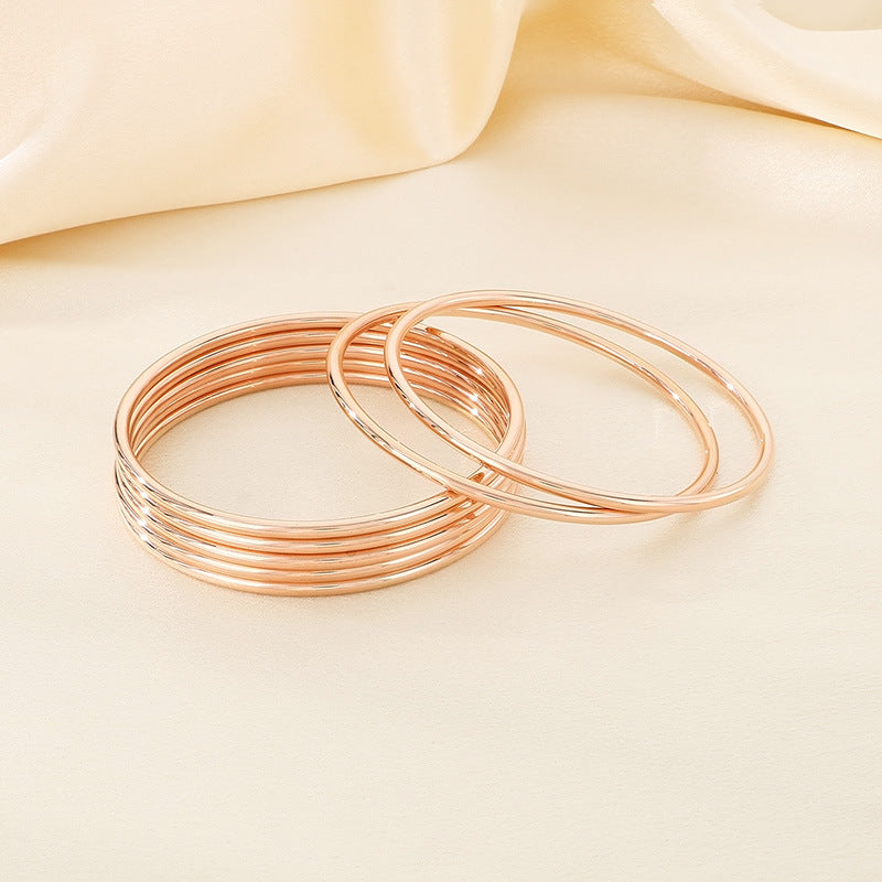 Armreif „Serra“ – Eleganter Damen-Armreif aus Titanstahl in Gold, Silber oder Roségold