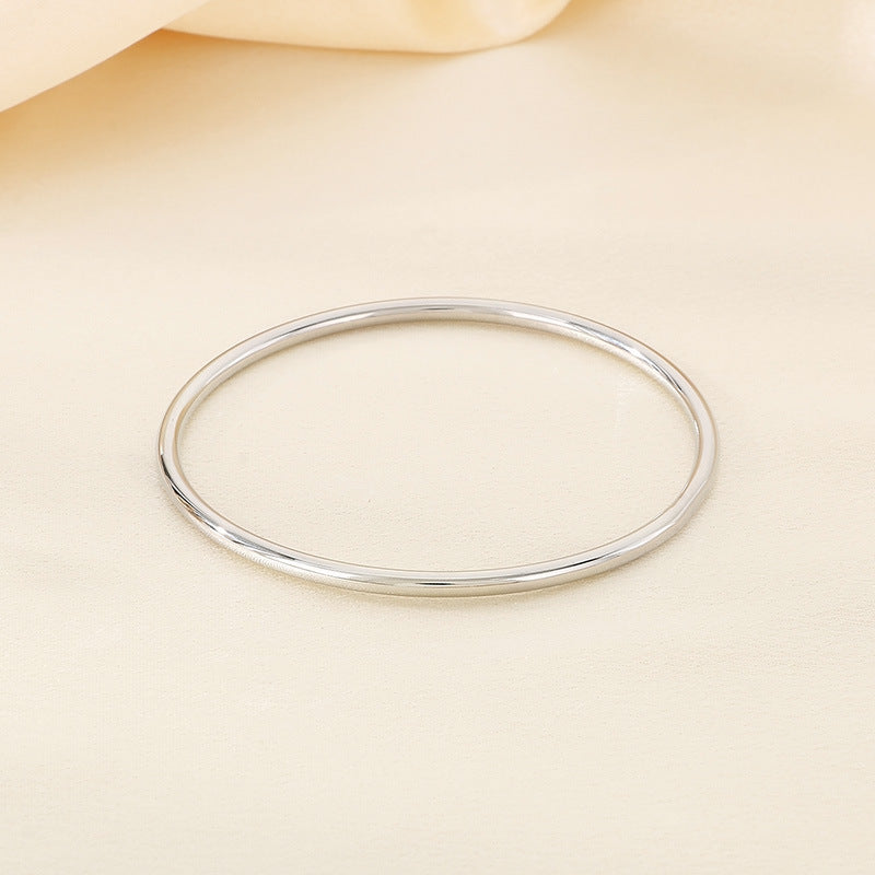 Armreif „Serra“ – Eleganter Damen-Armreif aus Titanstahl in Gold, Silber oder Roségold