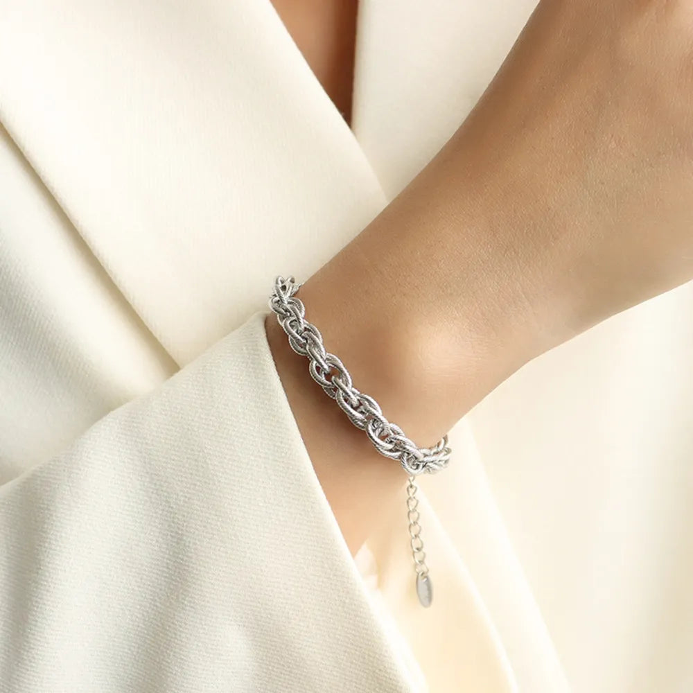 Armband „Niora“ – Gliederarmband aus Titanstahl, vergoldet